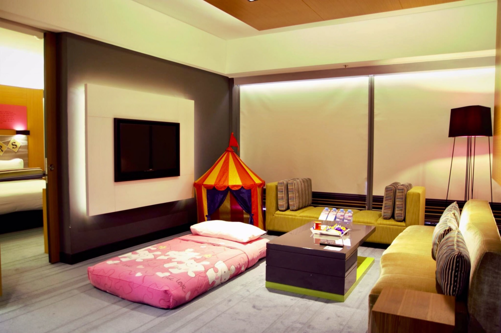 Aloft Kuala Lumpur Sentral can arrange for Camp Aloft to be set up in your hotel room, which includes a kids' air mattress, tent, and goodie bag with games for kids. Photo: Aloft