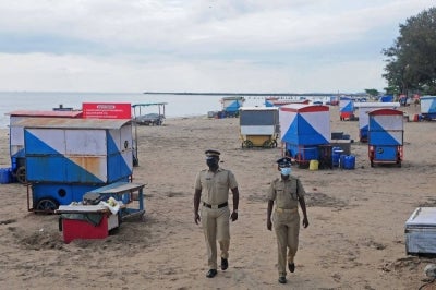 Security personnel patrol near a deserted Kozhikode beach after restrictions were imposed by the district administration in Kozhikode, in India's southern state of Kerala on September 18, 2023. (AFP file photo)