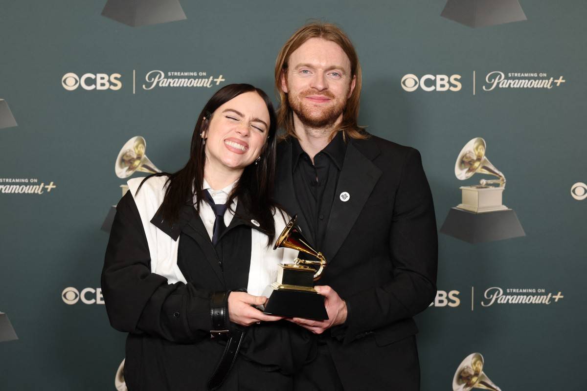 (L-R) Billie Eilish and FINNEAS, winners of the Song Of The Year award for "WILDFLOWER", pose in the press room during the 68th GRAMMY Awards at Crypto.com Arena on February 01, 2026 in Los Angeles, California. (Photo by Amy Sussman / AFP)