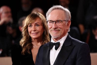 BEVERLY HILLS, CALIFORNIA - JANUARY 11: (FOR EDITORIAL USE ONLY) (L-R) Kristie Macosko Krieger and Steven Spielberg attend the 83rd Annual Golden Globe Awards at The Beverly Hilton on January 11, 2026 in Beverly Hills, California. (Photo by Amy Sussman / AFP)