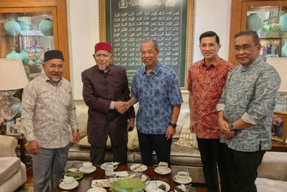 The recent meeting between Muhyiddin (third from left) and Abdul Hadi (second from left), accompanied by Pas and Bersatu leaders, was supposed to serve as a catalyst to resolve the polemic over the vacancy of the PN Chairman post that has dragged on for nearly a month