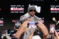 Bad Bunny speaks onstage during the Super Bowl LX Pregame & Apple Music Super Bowl LX Halftime Show Press Conference at Moscone Center West on February 05, 2026 in San Francisco, California. (Photo by Mike Coppola / AFP)