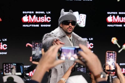 Bad Bunny speaks onstage during the Super Bowl LX Pregame & Apple Music Super Bowl LX Halftime Show Press Conference at Moscone Center West on February 05, 2026 in San Francisco, California. (Photo by Mike Coppola / AFP)