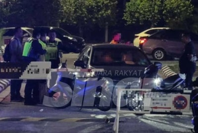 Police arrested a 50-year-old man after he allegedly chased a young woman with a knife at a supermarket here on Saturday night.