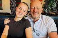 Lucy and her dad.- Agency