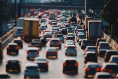 With Malaysia’s roads facing increasing congestion amid rapid urbanisation, a surge in vehicle growth and limited road infrastructure improvements, commuters are spending longer hours in traffic than ever before. Photo illustrated via Canva