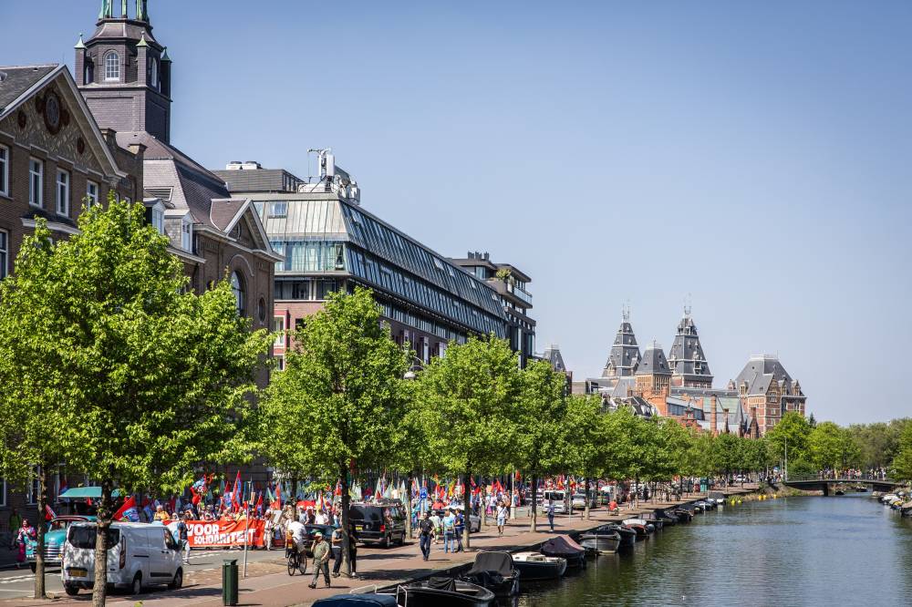 Demonstrators march during a May Day (Labour Day) rally, marking International Workers' Day, in Amsterdam, on May 1, 2025. (Photo by Dingena Mol / AFP)