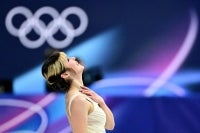 USA's Alysa Liu reacts after competing in the figure skating women's single skating short program during the Milano Cortina 2026 Winter Olympic Games at Milano Ice Skating Arena in Milan. Photo by Julien De Rosa/AFP