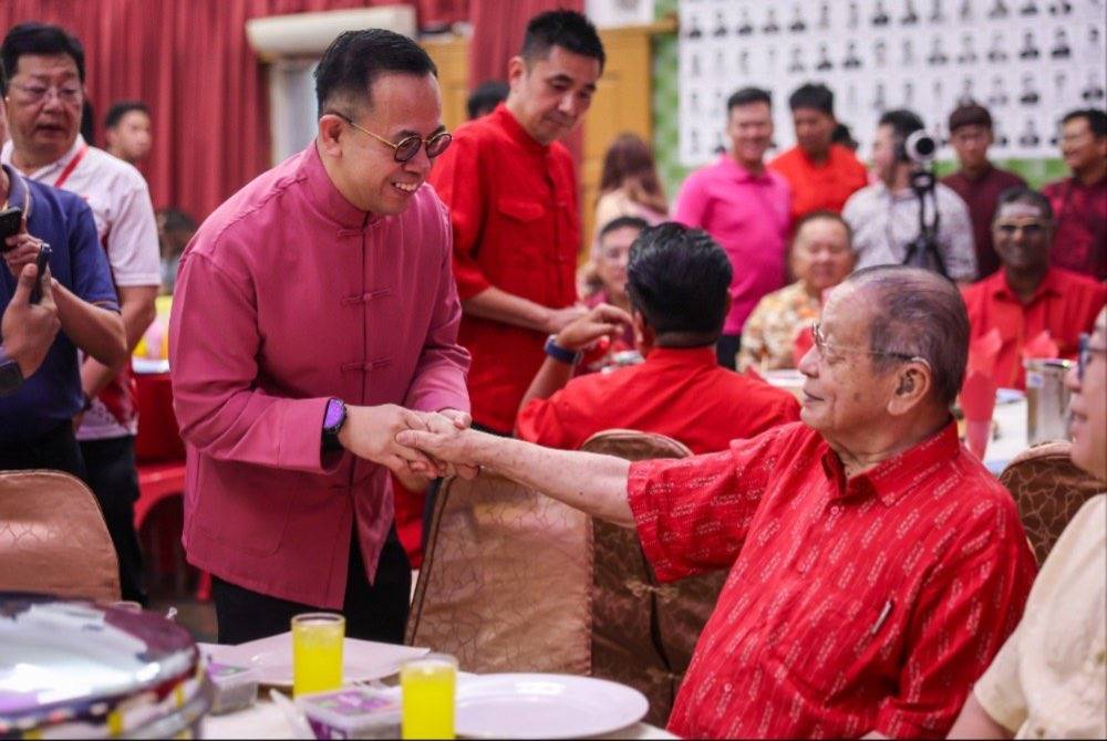 Steven Sim at the DAP Penang Chinese New Year Open House here last night. Photo by Bernama