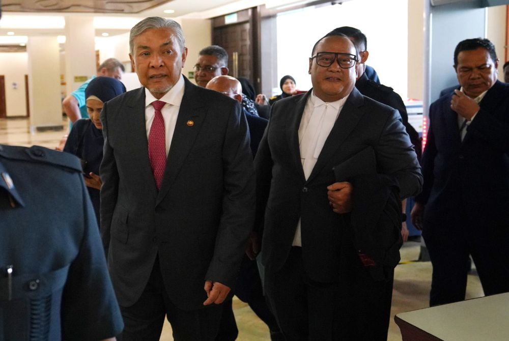 Deputy Prime Minister Datuk Seri Ahmad Zahid Hamidi arrived at the Kuala Lumpur High Court, today for his application to be fully acquitted (DNA) of 47 charges involving criminal breach of trust, corruption and money laundering linked to Yayasan Akalbudi funds. - Photo by ROSLI TALIB