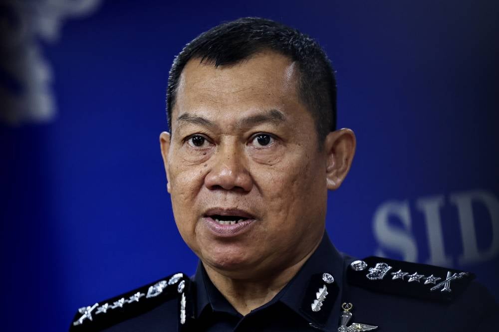 Johor police chief Datuk Ab Rahaman Arsad during a press conference, today, on the abuse of the image and voice of State Women, Family and Community Development Committee chairman Khairin-Nisa Ismail@Md On in a suspected scam. - Photo by Bernama