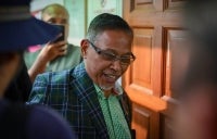 Terengganu Committee on Infrastructure, Utilities and Rural Development chairman Datuk Hanafiah Mat pleaded not guilty today at the Sessions Court to two charges of using his position to gain benefits for his family in 2018 and 2020. - Photo by Bernama