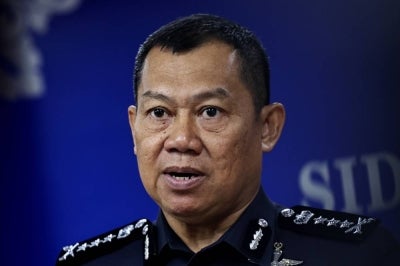 Johor police chief Datuk Ab Rahaman Arsad during a press conference, today, on the abuse of the image and voice of State Women, Family and Community Development Committee chairman Khairin-Nisa Ismail@Md On in a suspected scam. - Photo by Bernama