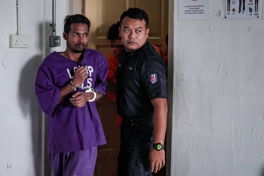 A Rohingya man was charged in the Magistrate's Court on two charges including murdering his pregnant wife on Feb 13. Photo by Bernama