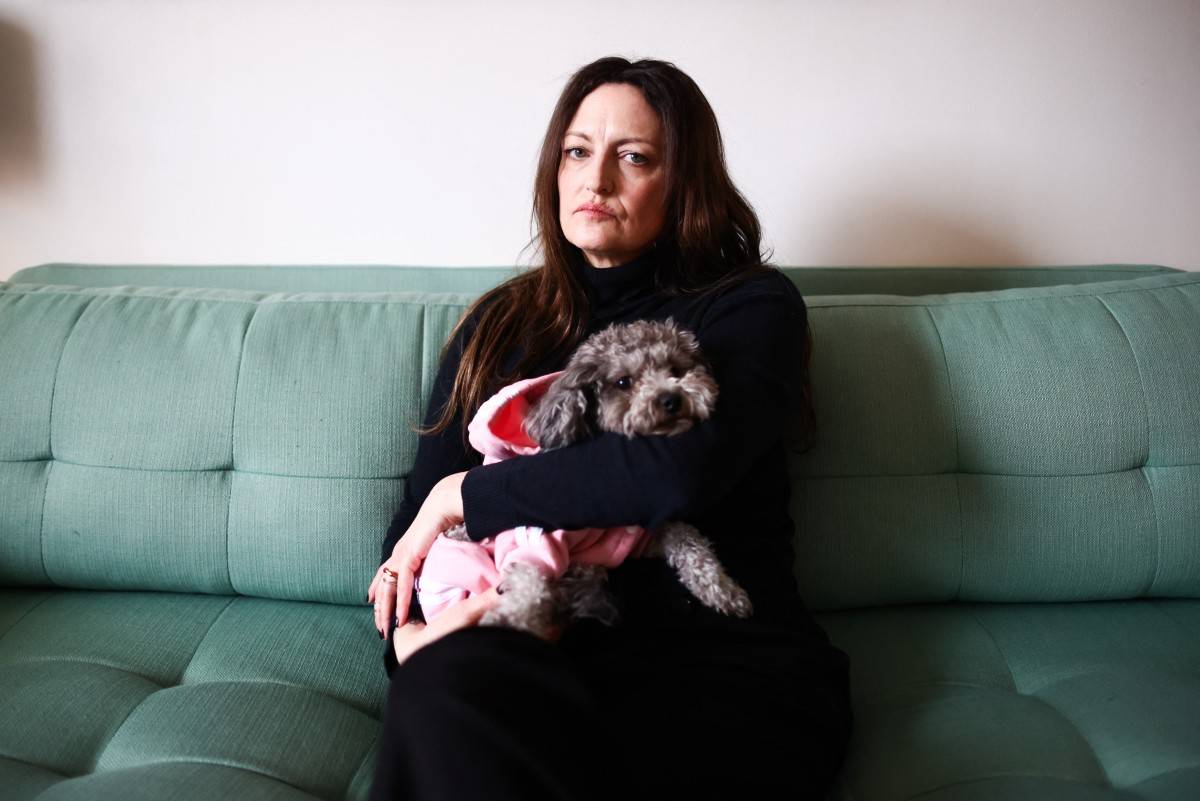Claire Brosseau, a Canadian woman who has been denied access to Canada's Medical Assistance in Dying program is photographed at her home in Toronto, Canada. Photo by Cole Burston/AFP