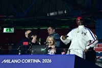 US rapper Snoop Dogg (R) (Photo by JULIEN DE ROSA / AFP)