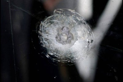 The vehicle carrying the commander of the Malaysian Control and Border Protection Agency (MCBA) in Bukit Kayu Hitam, SAC Mohd Nasaruddin Mohd Nasir, was shot at in an incident at dawn near the Malaysian-Thai border today. Photo for illustrative purposes only - AFP FILE PIX