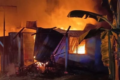 Five members of a family were burnt to death in a fire that engulfed a house in Kampung Pamah Kulat here early today. Photo: Pahang Fire and Rescue Department