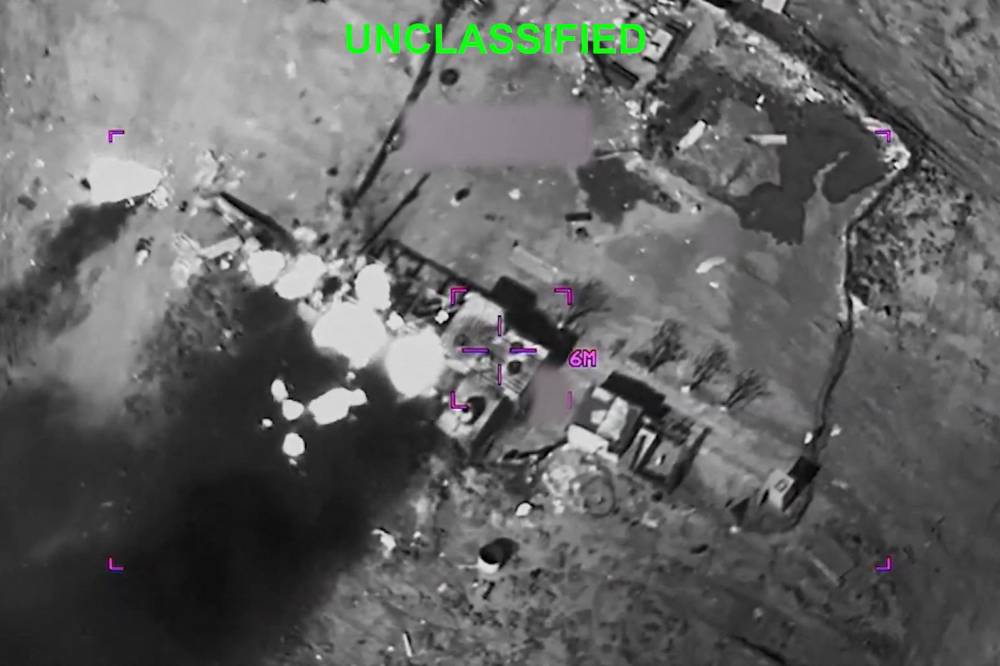 In this screen grab obtained on February 28, 2026 from video released by the US Central Command on their X account @CENTCOM shows smoke rising from an Iranian facility after it was destroyed by strikes carried out by US and Israel against Iran earlier in the day. (Photo by US Central Command / AFP) 