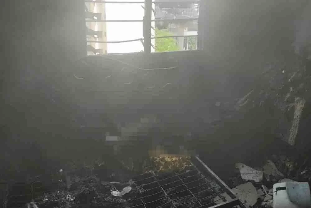 The child's charred body was found after firefighting efforts were carried out on the 10th floor of the residential block.