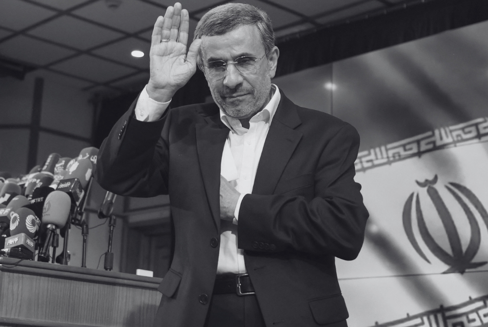 Iranian former president Mahmoud Ahmadinejad waves after registering his candidacy for Iran's upcoming presidential election in Tehran on June 2, 2024. (Photo by ATTA KENARE / AFP)