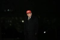 US President Donald Trump exits Marine One on the South Lawn upon returning to the White House in Washington, DC, on March 1, 2026. - (Photo by BRENDAN SMIALOWSKI / AFP)