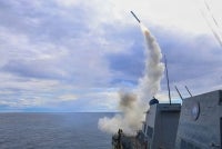 This US Navy photo released by US Central Command public affairs shows Arleigh Burke-class guided-missile destroyer USS Thomas Hudner (DDG 116) firing a Tomahawk land attack missile in support of Operation Epic Fury, from an undisclosed location on March 1, 2026. - (Photo by US Central Command (CENTCOM) / AFP)