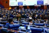 The atmosphere during the vote at the First Meeting of the Fifth Session of the 15th Parliament of the Dewan Rakyat at the Parliament Building yesterday. (BERNAMA PHOTO)