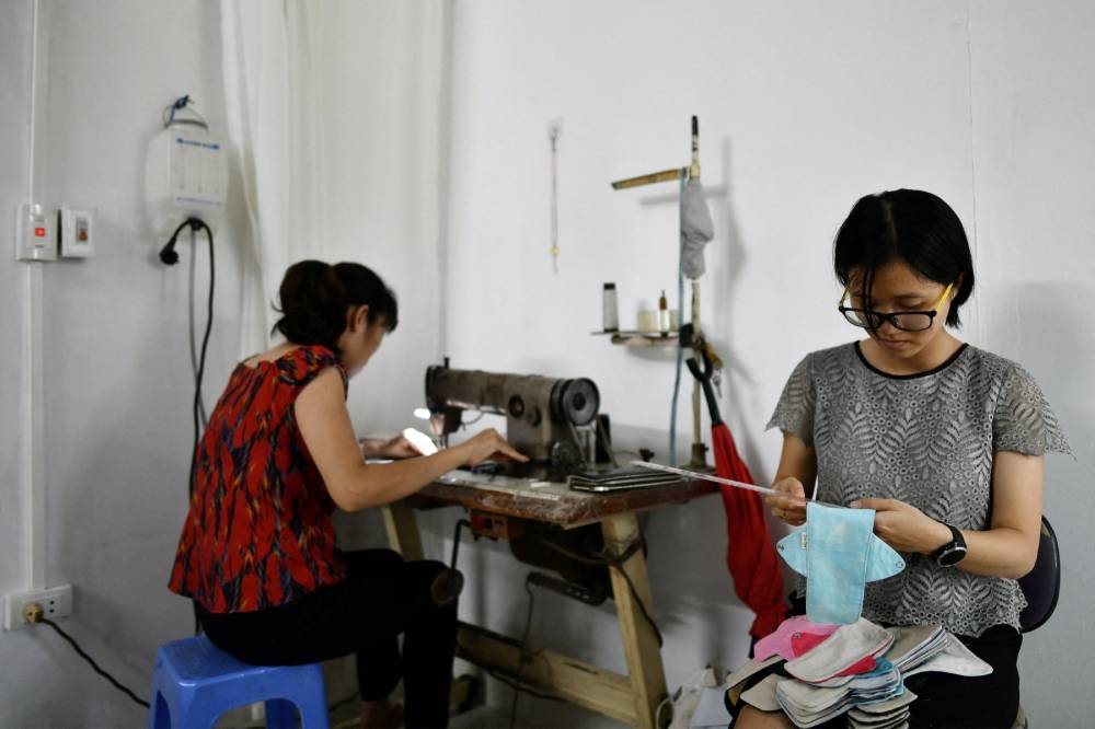 Creative seamstresses, from capital Hanoi to the southern city of Ho Chi Minh, are producing meticulously designed, affordable, and personalised wedding dresses that are penetrating international markets. AFP photo.