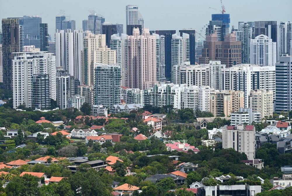A general view shows private and public residential high-rise buildings in Singapore on Feb 27, 2026. - (Photo by ROSLAN RAHMAN / AFP)