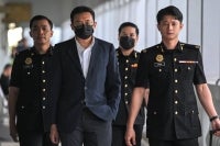 The chief executive officer of Perbadanan Stadium Malaysia (PSM) Iliyas Jamil, 42, was charged in the Sessions Court here today with seven counts of corruption involving RM1.45 million in connection with the RM8.7 million tender to upgrade the Bukit Jalil National Squash Centre. Photo by Bernama