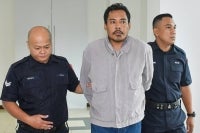Salesman Azmi Jantan, 42, pleaded guilty today in the Sessions Court to attacking a motorcyclist with a meat cleaver on the Federal Highway last Tuesday.