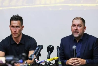Robert Friend's (left) contract as Harimau Malaya CEO ended on June 1 while head coach Peter Cklamovski’s was terminated two days ago. Photo: BERNAMA