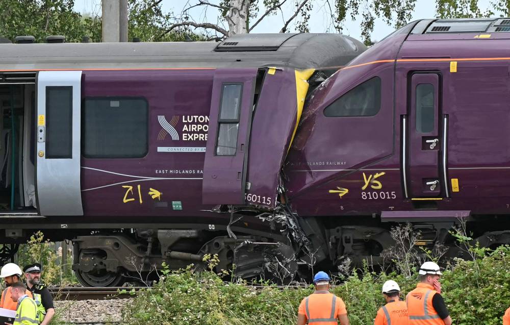 Nine people are in critical condition after a train crash near Bedford in Eastern England, which killed a driver and left around 100 passengers injured. (Photo by Justin Tallis / AFP)