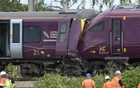 Nine people are in critical condition after a train crash near Bedford in Eastern England, which killed a driver and left around 100 passengers injured. (Photo by Justin Tallis / AFP)