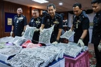 Police have arrested two brothers suspected of using their house in Kampung Duyong Besar here as a storage facility for drugs worth RM1.76 million. Photo by Bernama