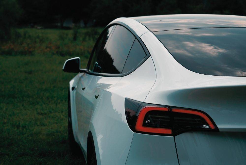 A woman was killed after a Tesla, which was allegedly in self-driving mode, crashed into a house in the US state of Texas. Photo for illustrative purposes only: Canva