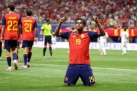 ATLANTA, GEORGIA - JUNE 21: Lamine Yamal #19 of Spain celebrates with teammate Rodri #16 after scoring his team's first goal during the FIFA World Cup 2026 Group H match between Spain and Saudi Arabia at Atlanta Stadium on June 21, 2026 in Atlanta, Georgia. (Photo by Justin Setterfield / AFP)