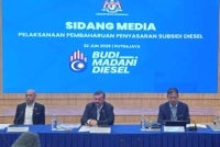Amir Hamzah (centre) at the press conference on the implementation of targeted diesel subsidies at the Treasury building on Monday.