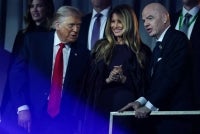 (From L) US President Donald Trump, US First Lady Melania Trump and Italian Fifa President Gianni Infantino chat after the results of the draw for the 2026 FIFA Football World Cup taking place in the US, Canada and Mexico, at the Kennedy Center, in Washington, DC, on Dec 5, 2025. - (Photo by Dan Mullan / POOL / AFP)