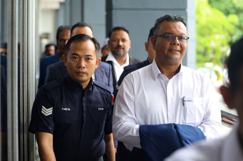 Jitra assemblyman Dr Haim Hilman Abdullah pleaded not guilty in the Seremban Magistrate's Court today to a charge of making statements likely to cause public alarm, allegedly committed on June 13. - Photo by Bernama
