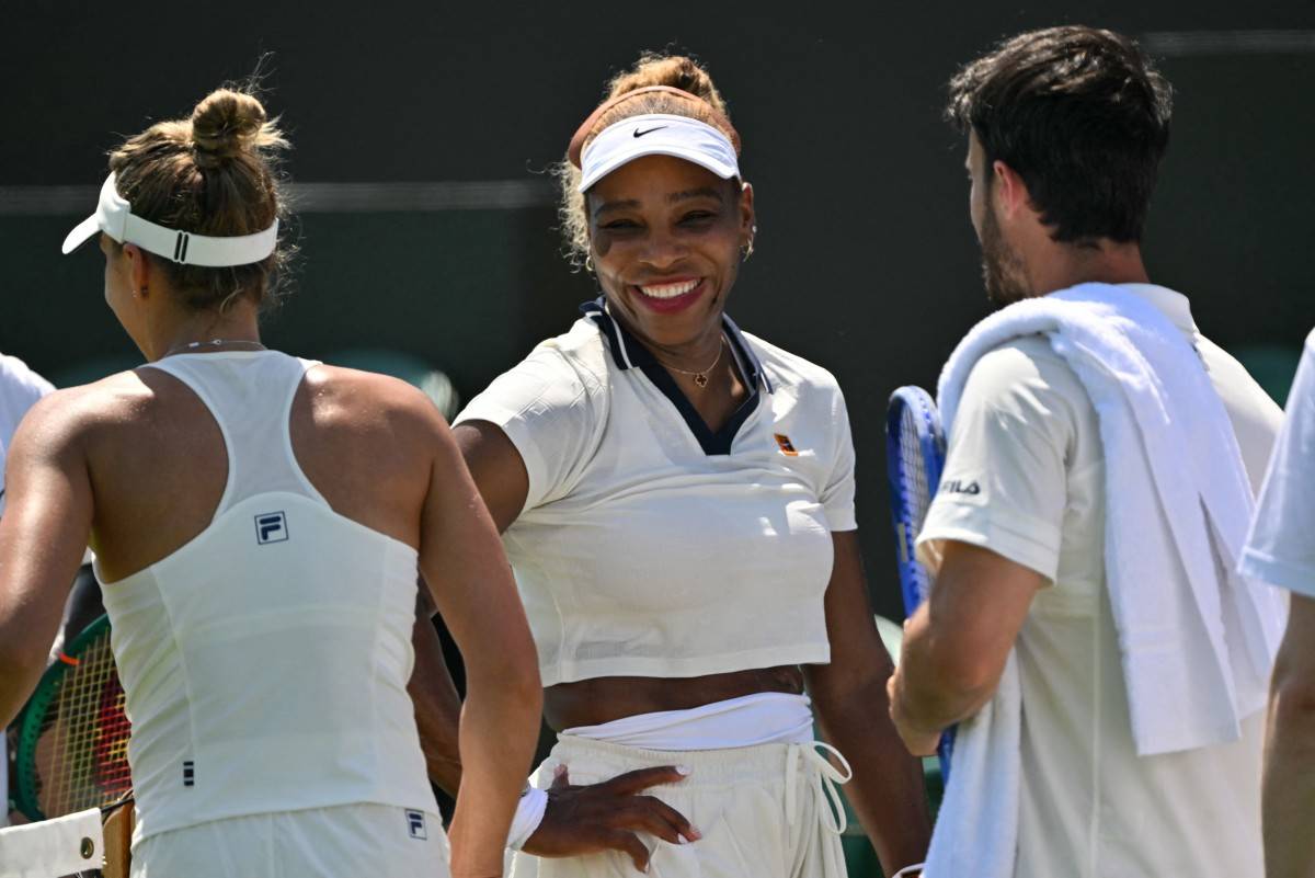 US player Serena Williams smiles at the practice courts at The All England Lawn Tennis and Croquet Club in Wimbledon, southwest London, on June 24, 2026, ahead of the 2026 Wimbledon Championships. (Photo by AFP) 