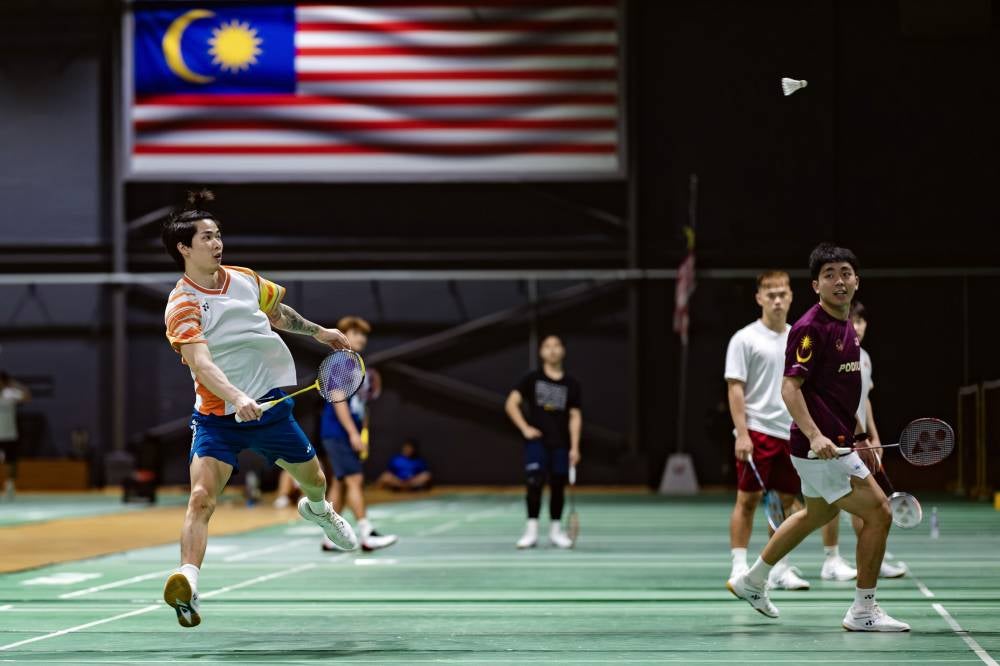 National mixed doubles player, Chen Tang Jie (left) undergoes a training session with the national badminton squad at the Academy Badminton Malaysia in Bukit Kiara.