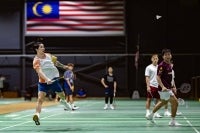 National mixed doubles player, Chen Tang Jie (left) undergoes a training session with the national badminton squad at the Academy Badminton Malaysia in Bukit Kiara.