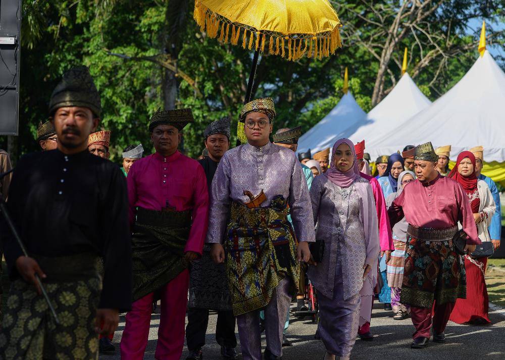 The Yang Dipertuan Besar of Negeri Sembilan, Tuanku Muhriz Tuanku Munawir, has formalised the installation of Muhammad Faris Johari as the 11th Undang of Luak Sungei Ujong at Istana Besar Seri Menanti this morning. Photo by Bernama
