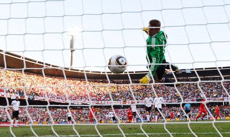 Germany's goalkeeper Manuel Neuer eyes the ball shot by England player Frank Lampard before the goal was disallowed during the 2010 World Cup round of 16 football match Germany vs. England on June 27, 2010. AFP FILE PIX