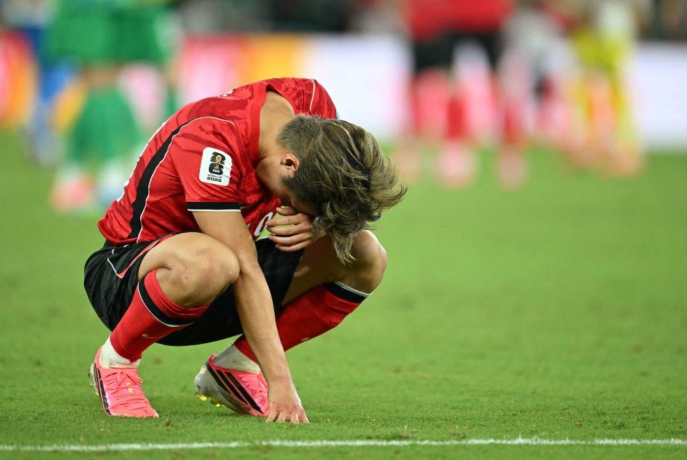South Korea's midfielder #19 Lee Kang-in reacts after his team lost the 2026 World Cup Group A football match between South Africa and South Korea at the Monterrey Stadium in Guadalupe, Mexico, on June 24, 2026. - (Photo by YURI CORTEZ / AFP)
