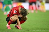 South Korea's midfielder #19 Lee Kang-in reacts after his team lost the 2026 World Cup Group A football match between South Africa and South Korea at the Monterrey Stadium in Guadalupe, Mexico, on June 24, 2026. - (Photo by YURI CORTEZ / AFP)