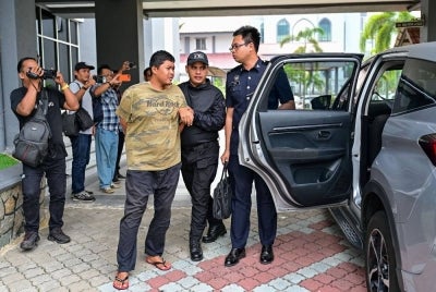 The Sessions Court today ordered Muhammad Nor Iman Abdullah, 25, charged with causing grievous hurt to his grandmother with a hammer to undergo a mental health assessment. - Photo by Bernama