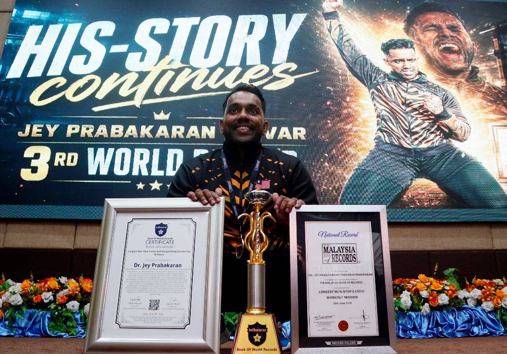 Fitness athlete K. Jey Prabakaran Thevar or better known as Dr Kjey dedicated his third world record-breaking feat in the 18-hour non-stop cardio and weightlifting event to his late father. Photo by Bernama
